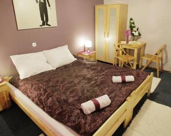 Dragon Aparthostel Senatorska - קראקוב - חדר שינה