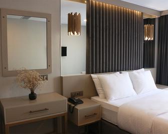 Air Boss Giresun City Hotel - Giresun - Спальня