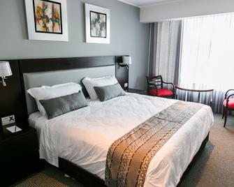 Apart Hotel Petit Palace Suites - Lima - Yatak Odası