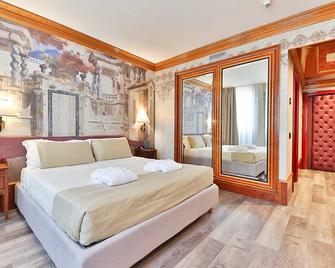 Hotel Leon D'oro - Verona - Schlafzimmer