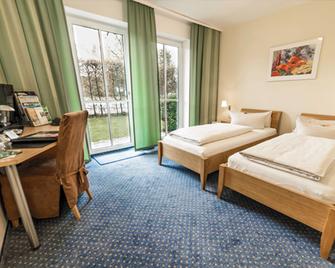 Arcus Hotel garni - Vaterstetten - Спальня