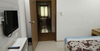 Usha Residency - Bhuj - Bedroom