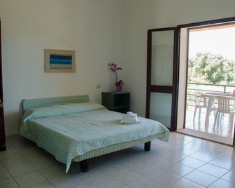 Residence Cort'e Accas - Bari Sardo - Camera da letto