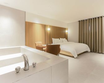 Hotel Inn Cafe Paju Geumchon Branch - Paju - Camera da letto