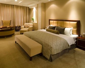 Nanchang Galactic Peace International Hotel - Nanchang - Bedroom