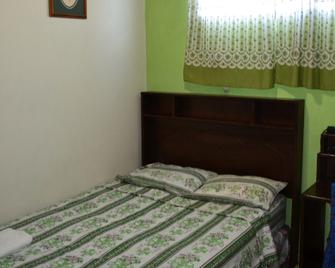 Hotel Oasis - San Salvador - Habitación
