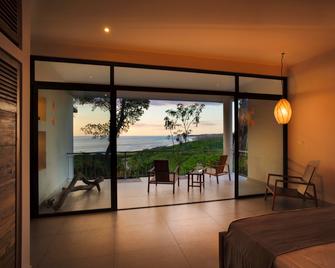 Hotel Boutique Lagarta Lodge - Nosara - Quarto