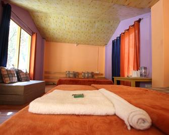 Brick and Wood Cottages - Kasol - Habitación