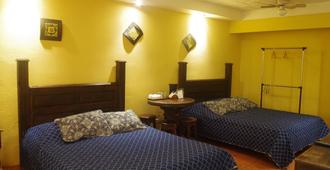 Melrost Airport Bed & Breakfast - Alajuela - Yatak Odası