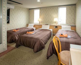 Hotel Fujiyoshi - Beppu - Bedroom