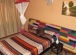 Flintstones Backpackers - Lusaka - Quarto