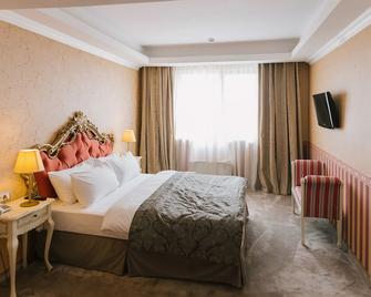 Roman Plaza - Roman - Bedroom