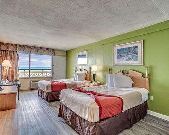 Atlantic Paradise Inn and Suites - מירטל ביץ' - חדר שינה