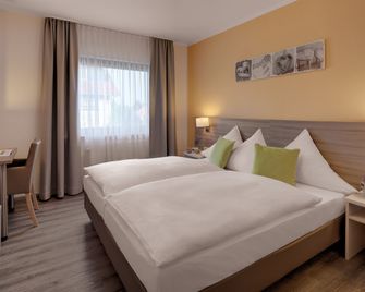 Kappelmuehle Gaestehaeuser - Grünstadt - Schlafzimmer