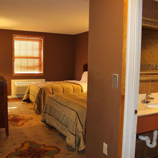 Bedroom view of Whalers Inn and Suites