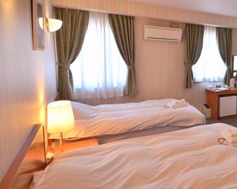 Hotel Preston Yoshida - Yoshida - Camera da letto
