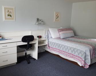 Country Squire Motel - Littleton - Habitación