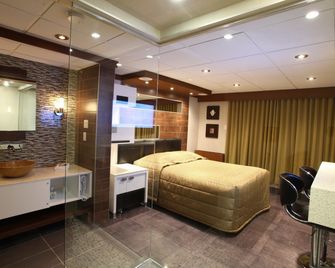 Hotel Le Chablis Cadillac - מונטריאול - חדר שינה