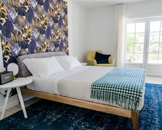 Emcasa Guesthouse - Lourinhã - Schlafzimmer