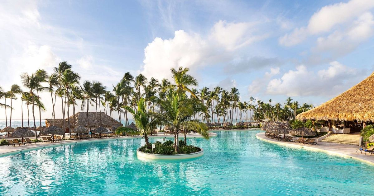 sachin and babi light blue dress Staying at Club Med Punta Cana, Dominican Republic, an All Inclusive Review main image 1