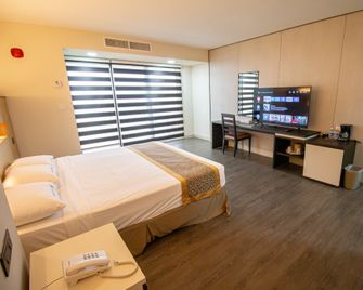 Bayview Hotel Guam - טאמונינג - חדר שינה