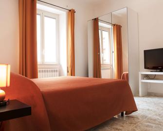 Michelangelo Apartment - Civitavecchia - Camera da letto