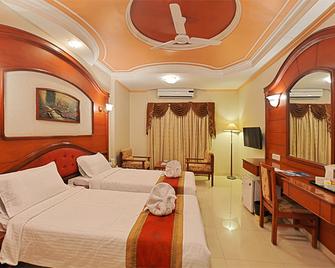 Hotel Gnanam - Thanjāvūr - Slaapkamer