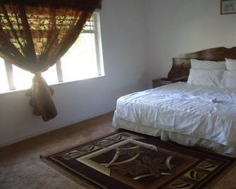 Rainbow Guesthouse - East London - Camera da letto