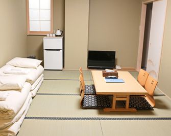 Akihabara Nakagawa Inn - Tokyo - Bedroom