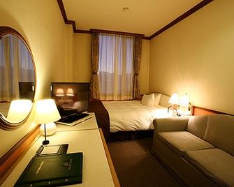 Hotel Sunlife Garden - Hiratsuka - Slaapkamer
