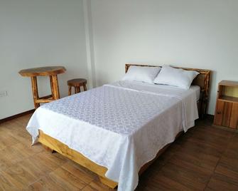 Zahara Lodge Hosteria - Tena - Schlafzimmer