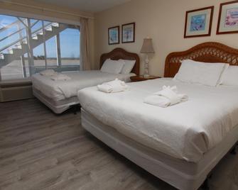 Fin 'N Feather Waterside Inn by Kees Vacations - Nags Head - Bedroom