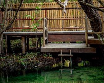 Hostel Bambu Gran Palas and Cenote - Tulum - Outdoors view