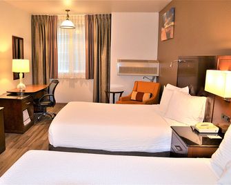 The Ashley Inn & Suites - לינקולן סיטי - חדר שינה