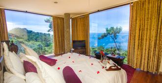 Issimo Suites Boutique Hotel & Spa - Adults Only - Manuel Antonio - Makuuhuone
