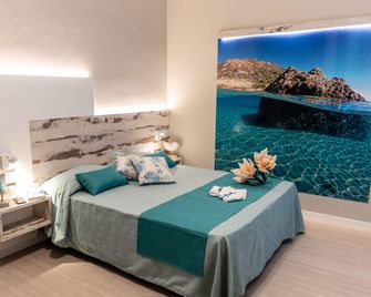 Hotel Acquamarina - بورتوفرّايو - غرفة نوم