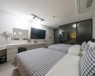 Jangan Hotel Bellus - Seoul - Kamar Tidur