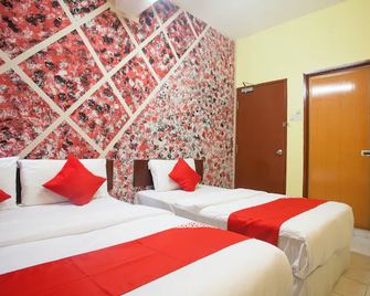 OYO 796 Jr Hotel - Pulau Pangkor - Schlafzimmer