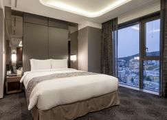 Tmark Grand Hotel Myeongdong - Сеул - Спальня
