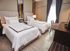 Corsica hotel - Kulai - Slaapkamer