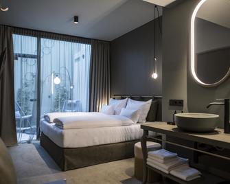 Altstadthotel Weisses Kreuz - אינזברוק - חדר שינה