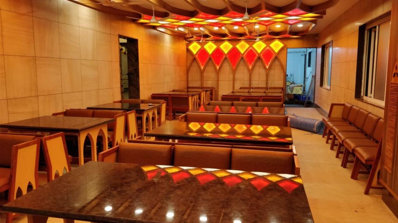 Annai in Saravana Bhavan Fine stay and Restaurant