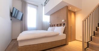 Hotel Gabbani - לוג'אנו - חדר שינה