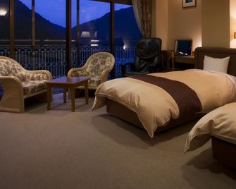 Hotel Hikyounoyu - מיושי - חדר שינה