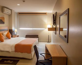 Corona Real - Guayaquil - Habitación