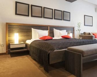 Relais Villa Giulia - Bastia umbra - Schlafzimmer