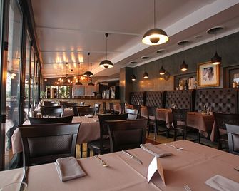 Atlas Posthotel - גרמיש-פרטנקירכן - מסעדה