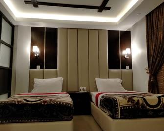Amin Hotel Peshawar - Peshawar - Bedroom