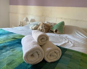 Posada Del Centro - וילה ג'נרל בלגראנו - חדר שינה