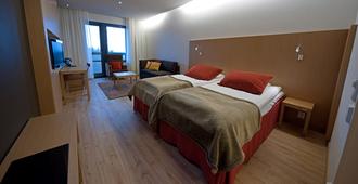 Hotel Levi Panorama & Levi Chalet Apartments - Sirkka - Camera da letto